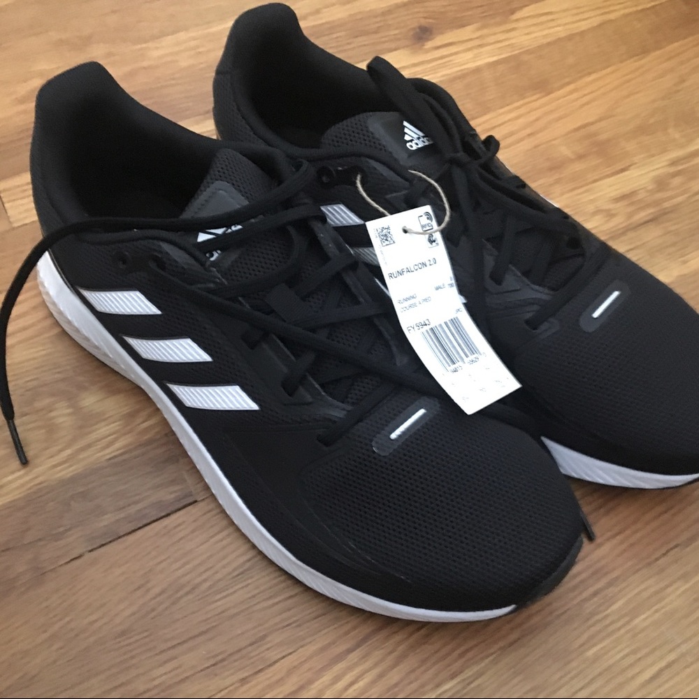 Adidas New on Box men’s size 8.5 Black with white stripes